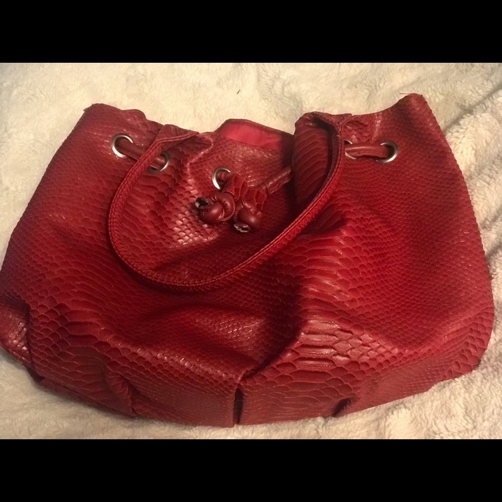 Signature Club A Snakeskin Handbag